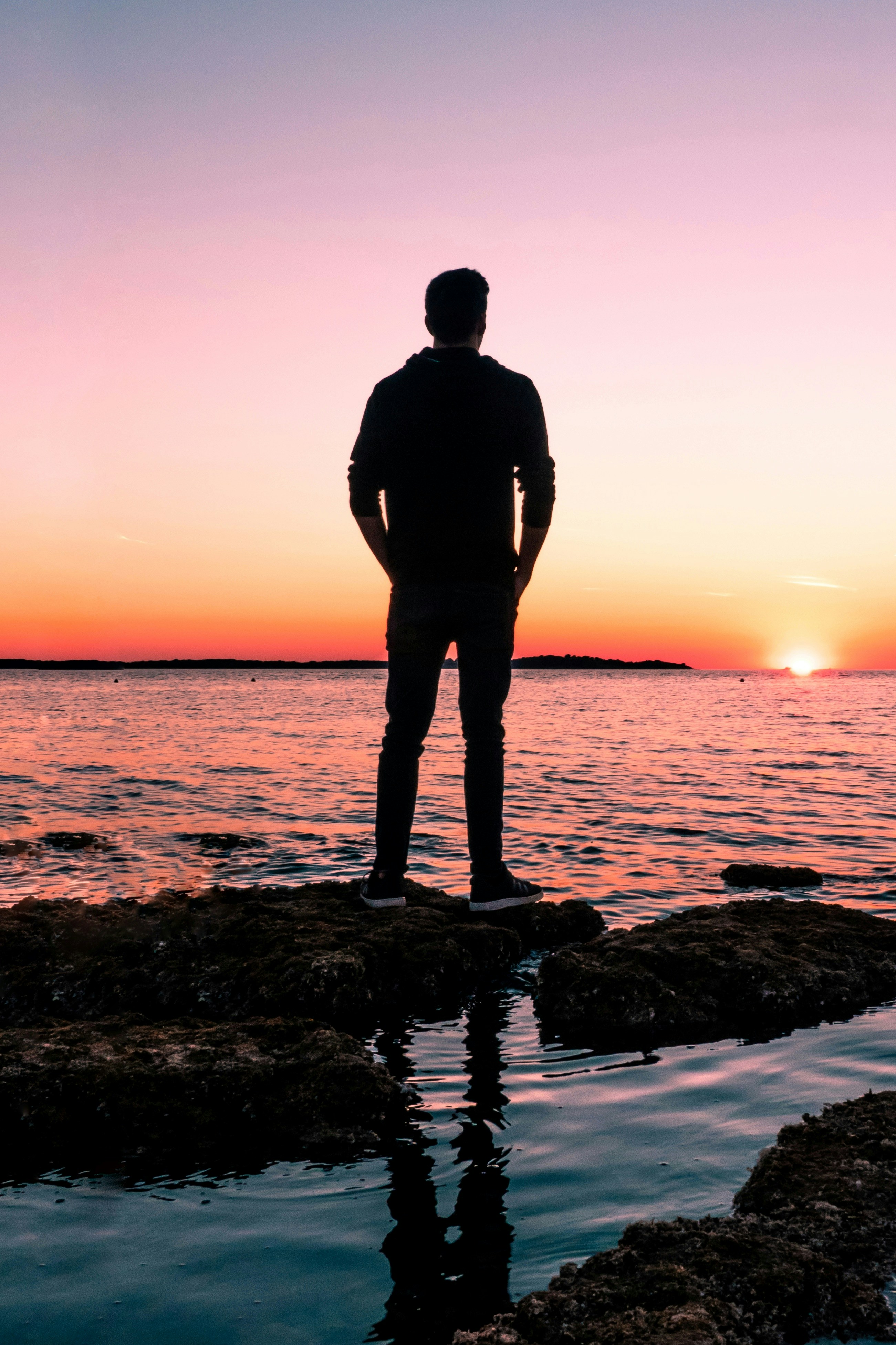 Example about me picture; person looking out at the ocean